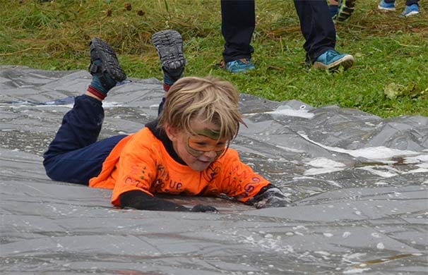 Mud, sweat and cheers at 'mini mudster' course for Mudmoiselle fundraiser post image