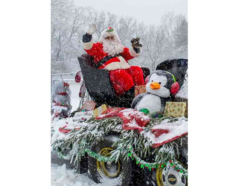 Snow made for a festive experience at Santa's Drive-Thru Parade in Puslinch post image