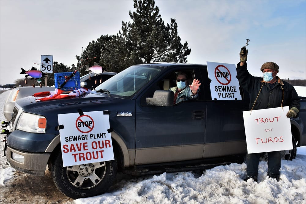 Erin residents opposed to sewage plant take to the street in protest post image