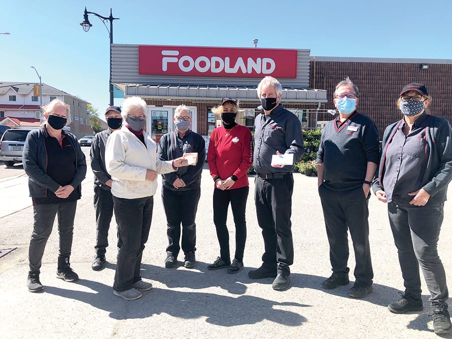 Carry On WI, historical society  recognize essential workers  at Minto Foodland stores post image