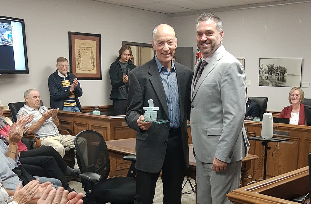 Volunteer of the Year recipient Ken Williams draws a crowd post image