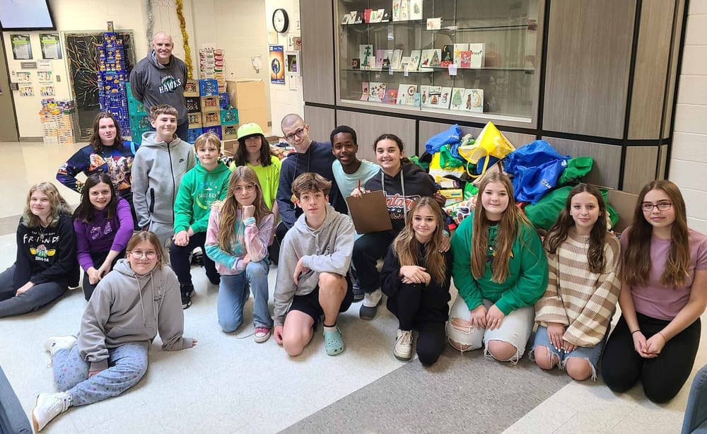 Grade 7, 8 students at JD Hogarth collect over 6,000 food bank donations post image