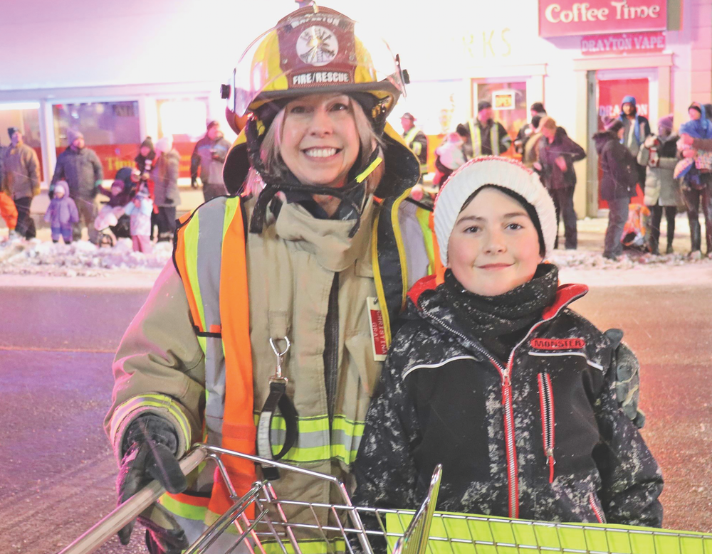 Santa and Mrs. Claus bring snow to Drayton’s annual parade post image