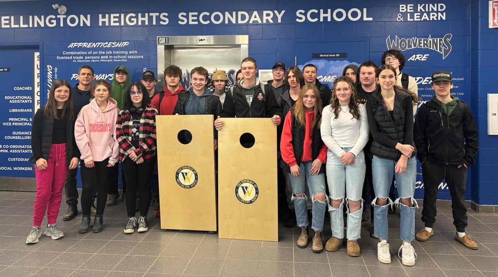 WHSS students make cornhole boards for township post image