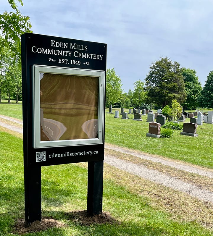 Eden Mills Community Cemetery adds a new double-sided sign post image