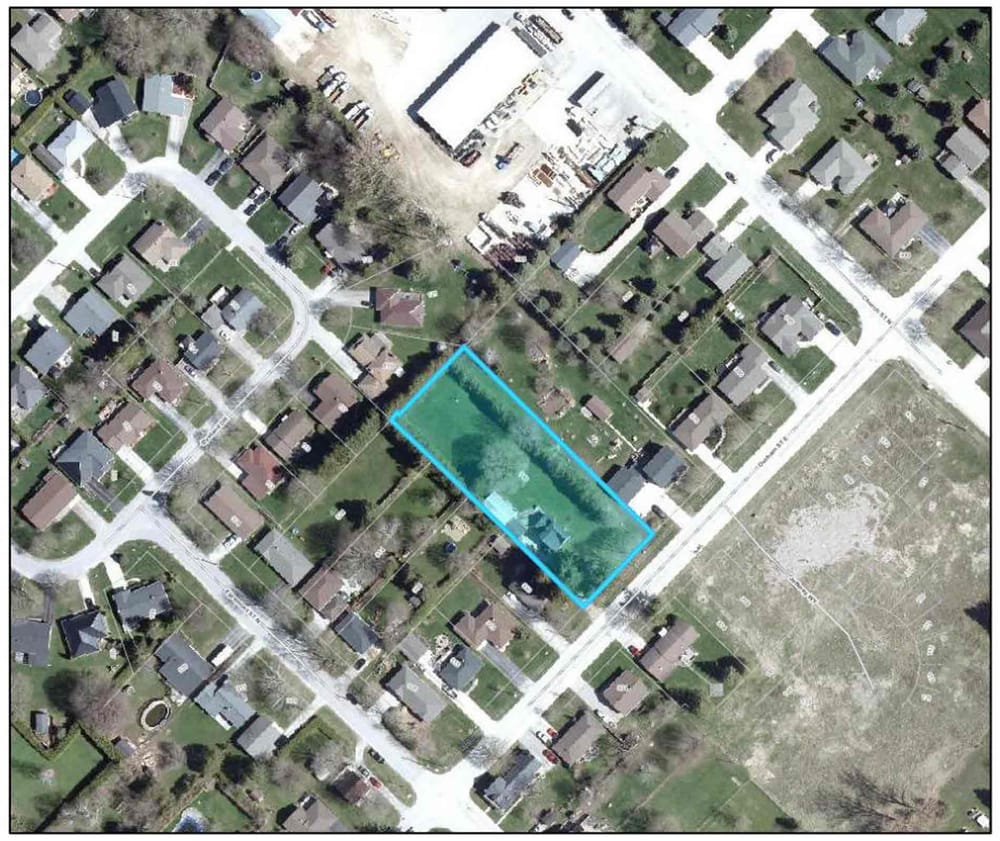 Neighbours, councillors hesitant about plans for four townhouses post image