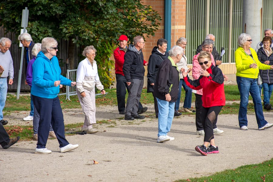 Participants recognize National Seniors Day with a Polker Walk