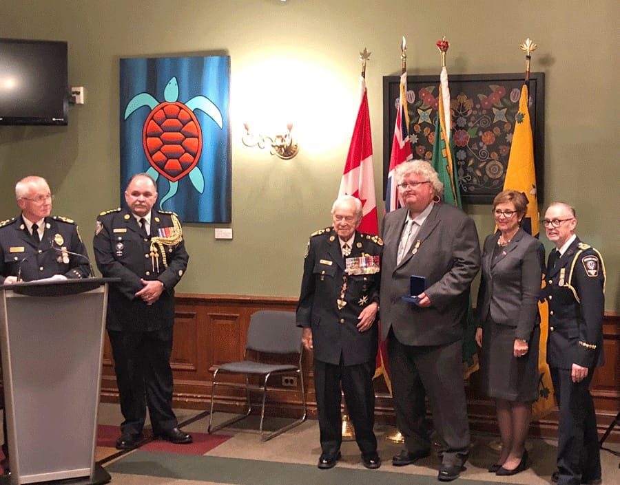 Local paramedics receive medals for 30 years of service