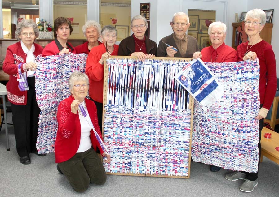 Merry Makers learn how milk bag mats are made