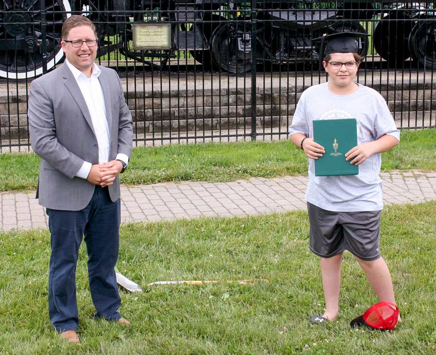 MP gives graduation gift to Palmerston student