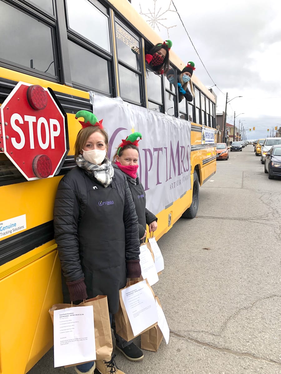 Arthur Optimrs Club fill a bus for local food bank