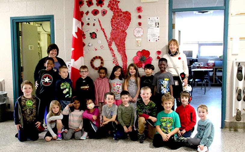 Remembrance starts with poppies, ends with respect at St. Mary Catholic School