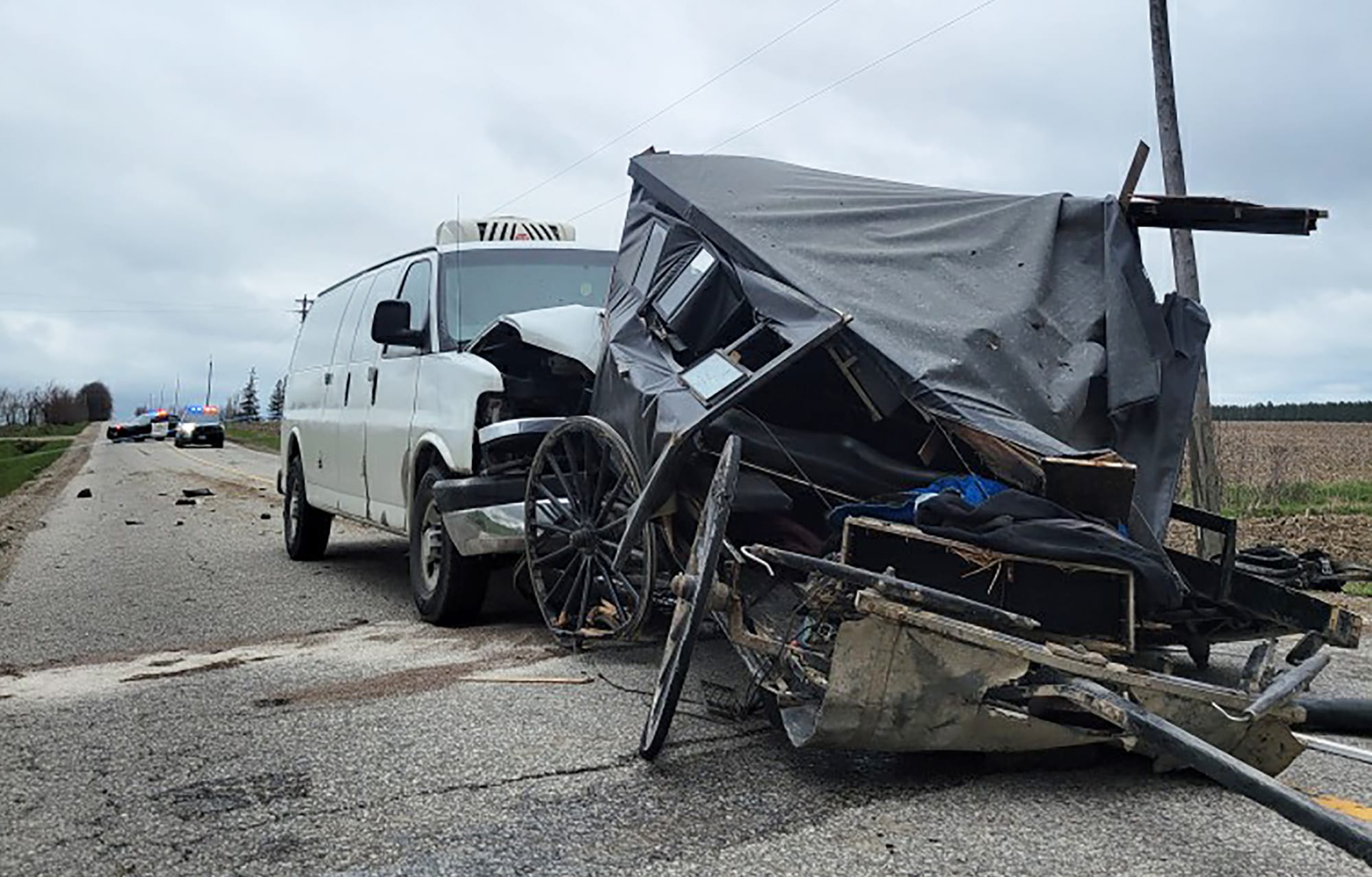 Five people injured after horse and buggy, van collide
