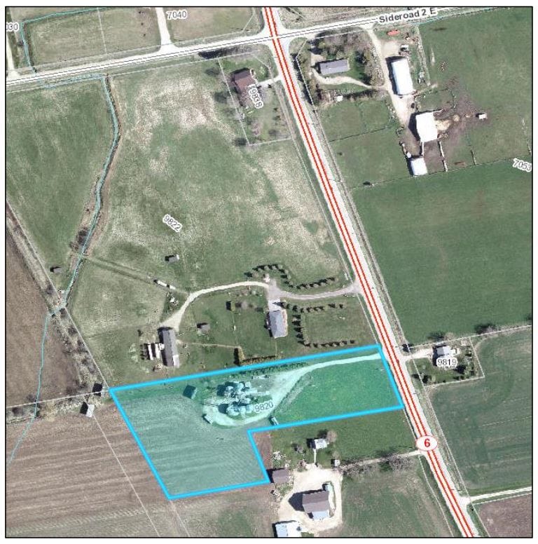 Council approves variance to permit grain bin close to property line