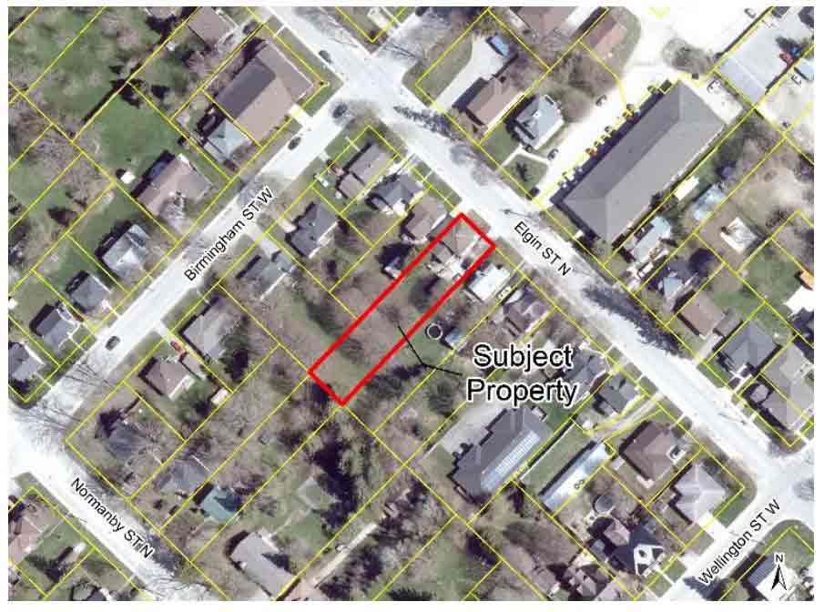 Council approves minor variance for new garage with residential unit