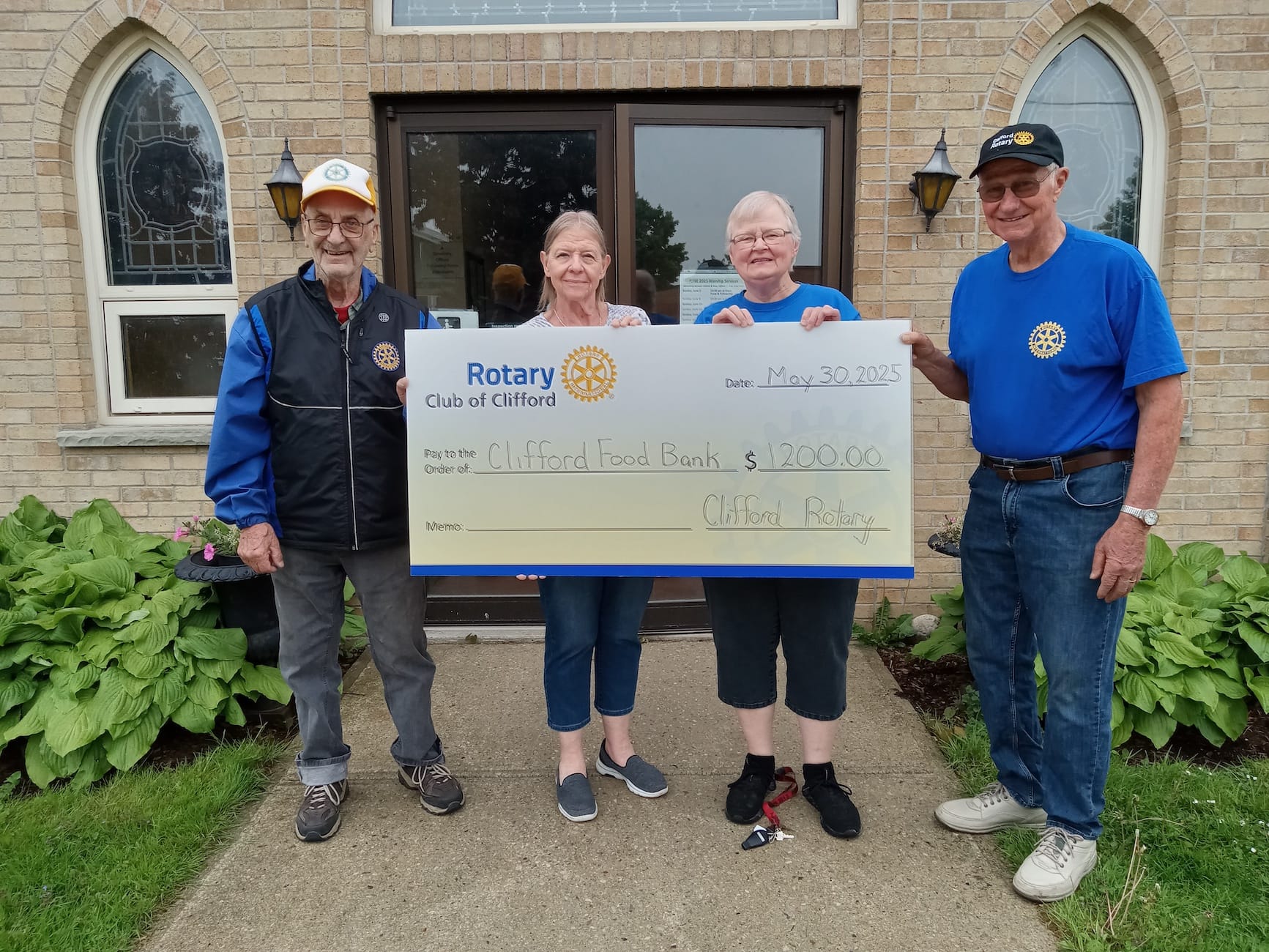 Clifford Rotary donates $1,200 to food bank