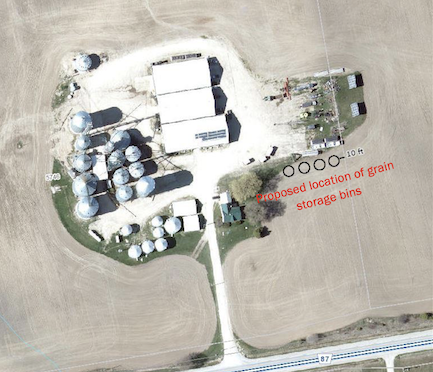 Minor variance approved to relocate grain storage bins